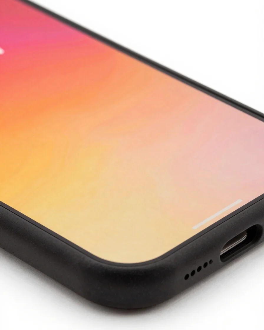 Macro close-up of an iPhone case with a vibrant custom graphic, focusing on the edge detailing and print clarity, bright